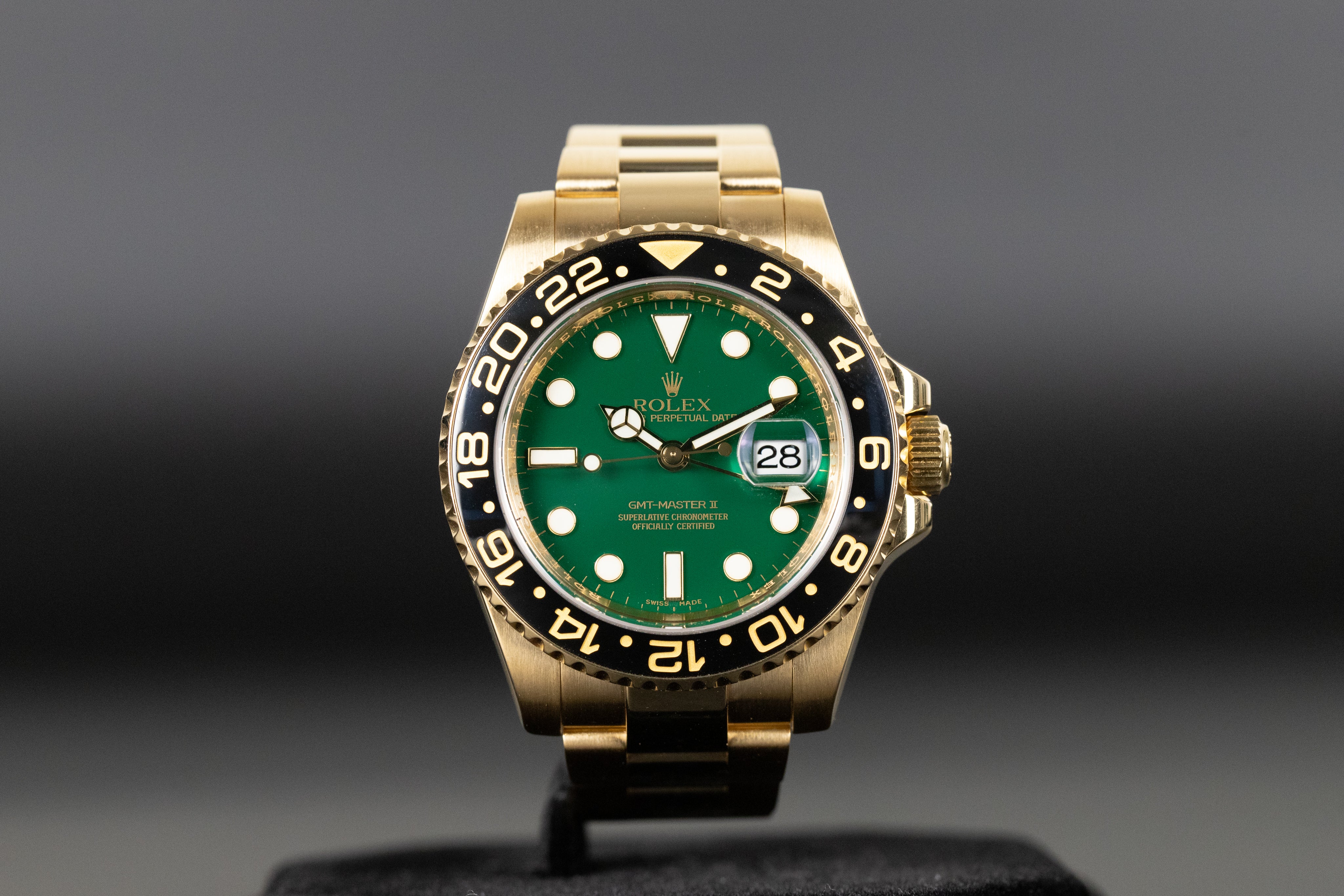 Rolex116718 GMT Master II Green Dial Newport Watch Club