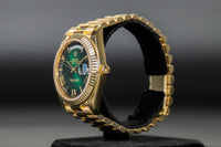 Rolex<br>228238 DayDate 40 Green Hombre Roman Numeral Dial