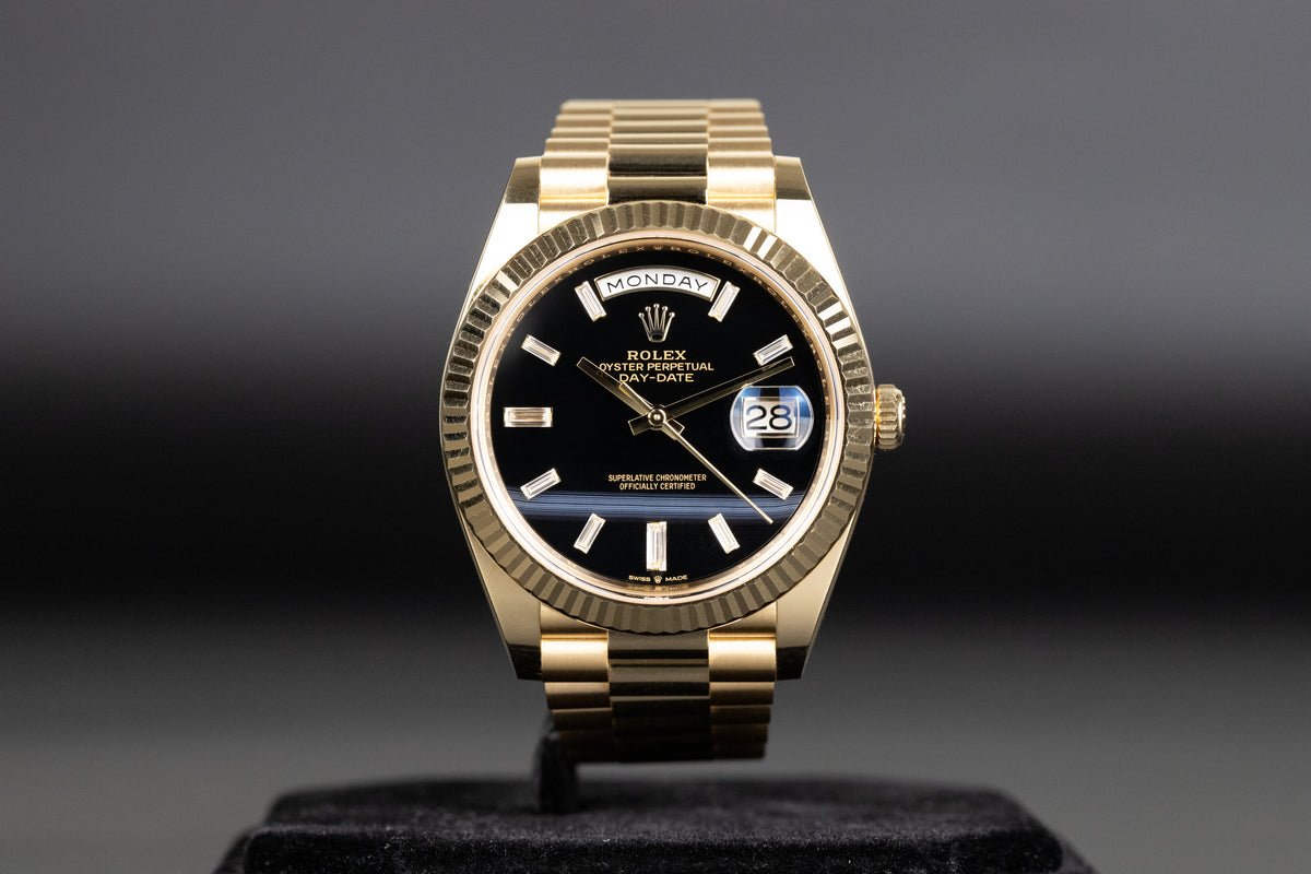 Rolex<br>228238 DayDate 40 Baguette Diamond Black Onyx Dial