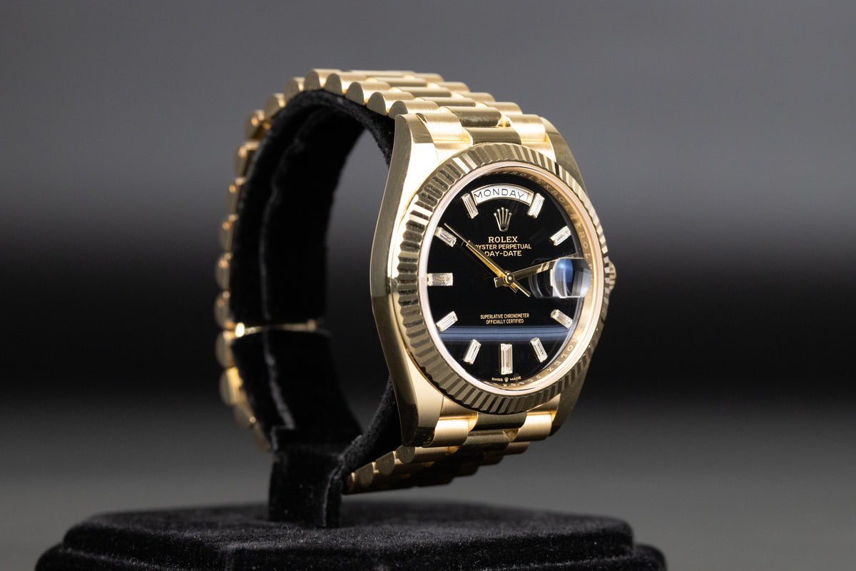 Rolex<br>228238 DayDate 40 Baguette Diamond Black Onyx Dial